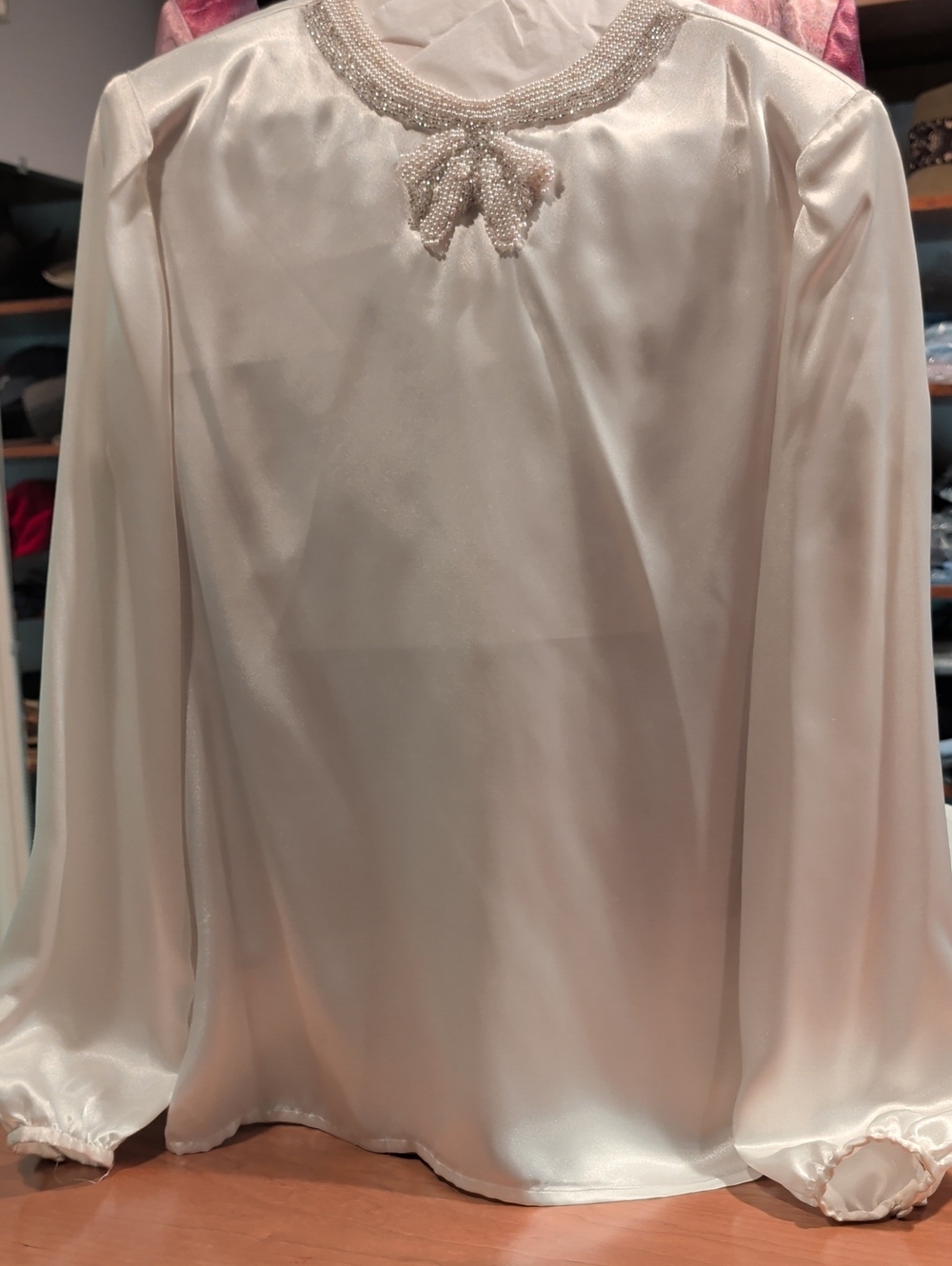 Jennifer Lloyd Elegant Ivory Beaded-Neck Satin Blouse With Covered Buttons